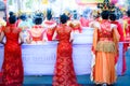 Ladies wear Chinese style costumes in a Chinese New Year parade