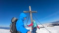 Ladinger Spitz - Couple reaching the summit cross of mountain peak Ladinger Spitz, Saualpe, Lavanttal Alps Royalty Free Stock Photo