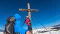 Ladinger Spitz - Couple reaching the summit cross of mountain peak Ladinger Spitz, Saualpe, Lavanttal Alps Royalty Free Stock Photo