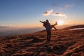 Ladinger Spitz - Couple standing on alpine meadow and enjoying beautiful sunset on mountain peak Ladinger Spitz, Saualpe, Royalty Free Stock Photo