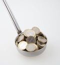 Ladle with coins