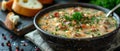 A ladle rests on a napkin next to a pot of Zuppa Toscana soup ready to serve. Concept Food Royalty Free Stock Photo