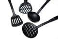 Ladle, spatula and skimmer from food plastic in black on a white background, isolate, kitchen utensils Royalty Free Stock Photo