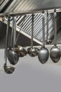 Ladles hanging on a Wall