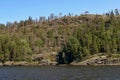 Ladoga skerries, stone islands overgrown with pines on Lake Ladoga in the national park of the Republic of Karelia Royalty Free Stock Photo