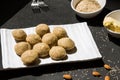 Ladoos or Indian sweet made from Sesame seeds,condensed milk,sugar and nuts.Known as Til Ladoo or Til Laddu in India. Royalty Free Stock Photo