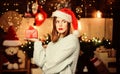 Lady adorable cute face celebrate christmas at home. Girl stylish makeup red lips making christmas wish. Cozy christmas