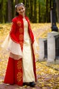 Lady in autumn forest Royalty Free Stock Photo