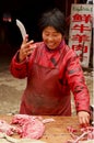 Lady Butcher Cutting Meat, Kaifeng