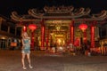 A lady dress stylishly standing in the Chinatown on Yaowarach road Bangkok Thailand