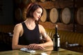 Lady at an expensive luxury restaurant with a bottle of wine elegant classy Royalty Free Stock Photo