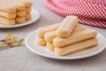 Lady finger biscuits, Italian dessert and sponge cookie on white plate Royalty Free Stock Photo