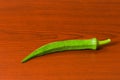 Lady finger okra closeup on isolated background