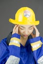 Lady firefighter suffering from headache