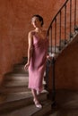 Lady in flapper dress on staircase Royalty Free Stock Photo