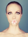 Lady with flowers in her mouth Royalty Free Stock Photo