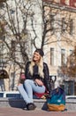 Lady girl happy smiles, sits skateboard Royalty Free Stock Photo