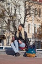 Lady girl happy smiles, sits skateboard Royalty Free Stock Photo