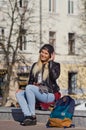 Lady girl happy smiles, sits skateboard Royalty Free Stock Photo