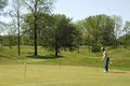 Lady On Golf Practice Green Royalty Free Stock Photo