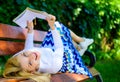 Lady happy face enjoy reading. Time for self improvement. Girl lay bench park relaxing with book, green nature Royalty Free Stock Photo