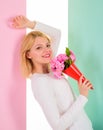 Lady happy received flowers from secret admirer. Woman smiling dreamy try guess who fall in love with her. Girl hold