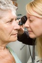 Lady having eye test examination