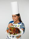 Lady with her roasted chicken Royalty Free Stock Photo