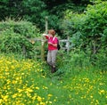 Lady Hiker Reading a Map Royalty Free Stock Photo