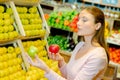 Lady holding apples two different varieties Royalty Free Stock Photo