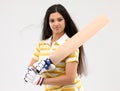 Lady holding cricket bat