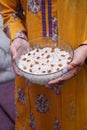 Lady holding kheer, rice pudding, dessert or sweet in hands. Food photography.