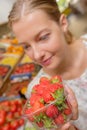 Lady holding punnet strawberries