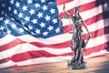 Lady Justice and American flag. Symbol of law and justice with U