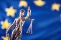 Lady Justice and European Union flag. Symbol of law and justice