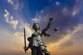 Lady justice at the Roemer in Frankfurt am Main symbolizes Justice with sword and scales