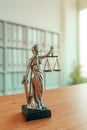 Lady Justice statue in law firm office