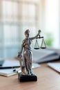 Lady Justice statue in law firm office Royalty Free Stock Photo