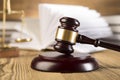 Lady of justice, Wooden & gold gavel and books Royalty Free Stock Photo