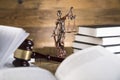 Lady of justice, Wooden & gold gavel and books Royalty Free Stock Photo