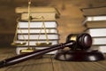 Lady of justice, Wooden & gold gavel and books Royalty Free Stock Photo