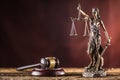 Lady Justicia holding sword and scale bronze figurine with judge Royalty Free Stock Photo