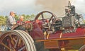 Lady learning to drive a traction engine