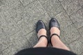 Lady legs in black shooes Royalty Free Stock Photo