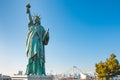 Lady liberty juxtaposed stand near Rainbow Bridge in Odaiba Royalty Free Stock Photo