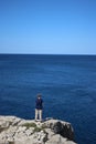 Lady looking out over Adriatic sea, Pula Croatia