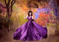 Lady in a luxury lush purple dress Royalty Free Stock Photo