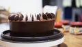 Lady making cream cake