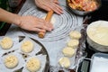 A lady making traditional Chinese buns at home Royalty Free Stock Photo
