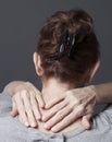Lady massaging her shoulders and head Royalty Free Stock Photo